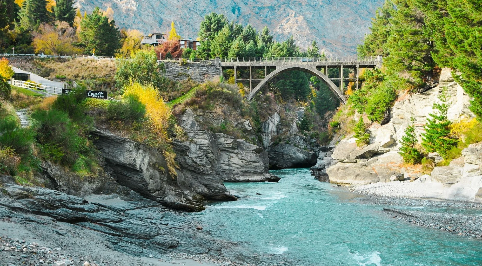 The stone arch of the Edith Cavell Bridge crossing the Shotover gorge at Arthurs Point